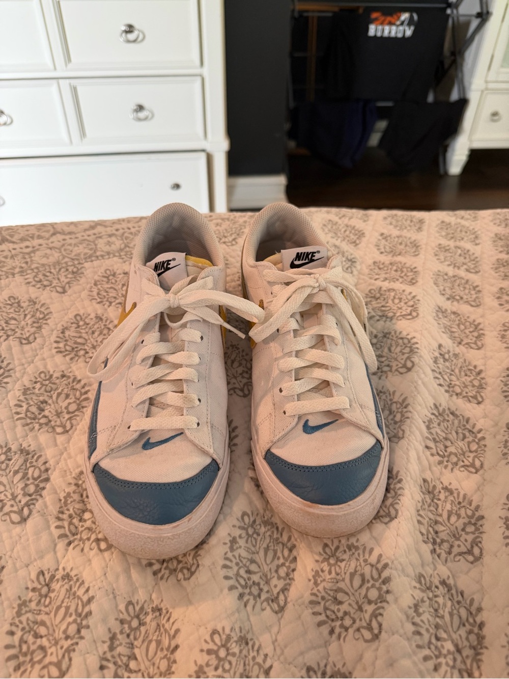 Nike White Low-Top Sneakers with Blue Toe and Swoosh